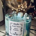 15oz crystal/botanical Candle.